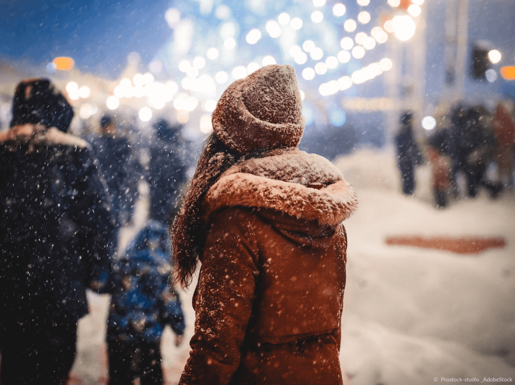 Schneegestöber am Weihnachtsmarkt